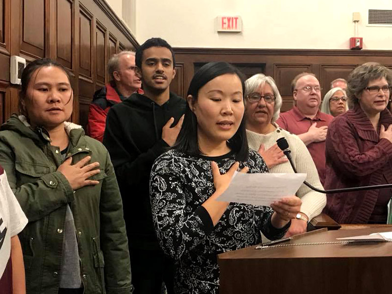 ESOL students reciting the pledge of allegiance